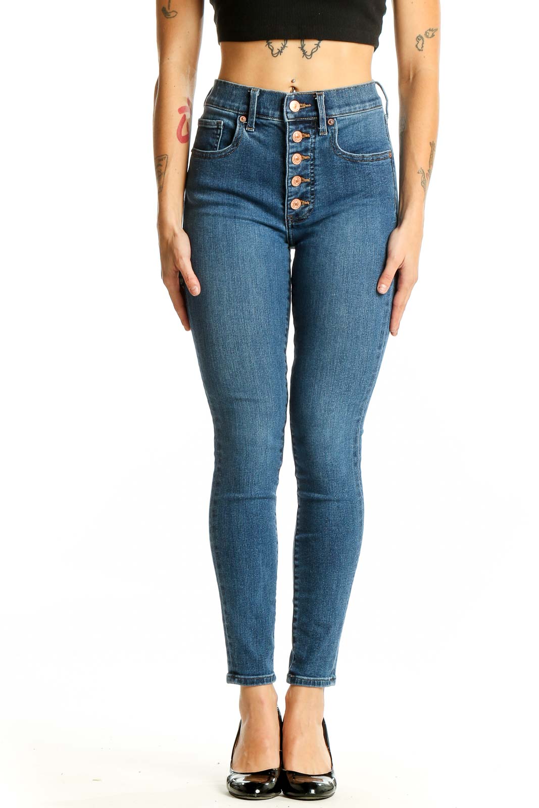 Front view of Express blue high-waisted skinny jeans with button-fly