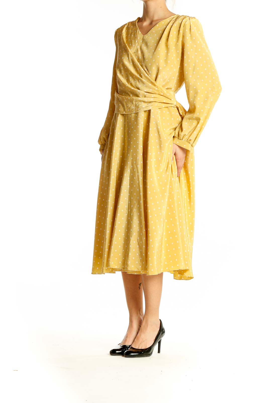 Front view of yellow polka dot wrap midi dress by SilkRoll