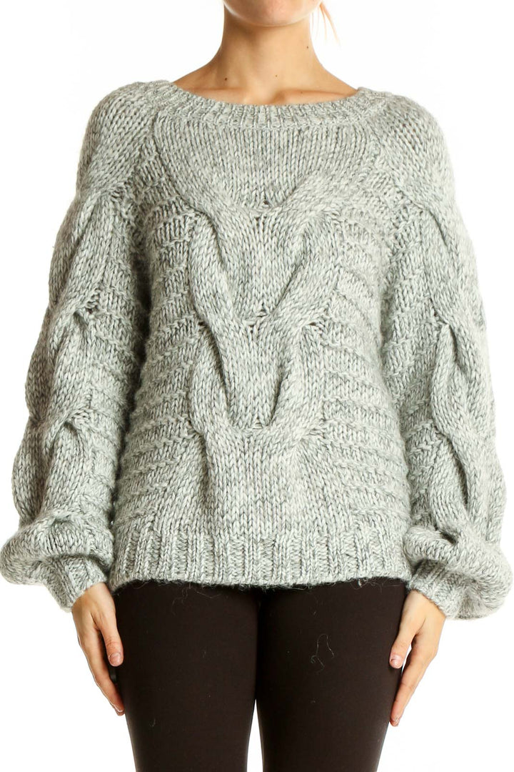 Front view of gray chunky cable knit oversized sweater from Gap