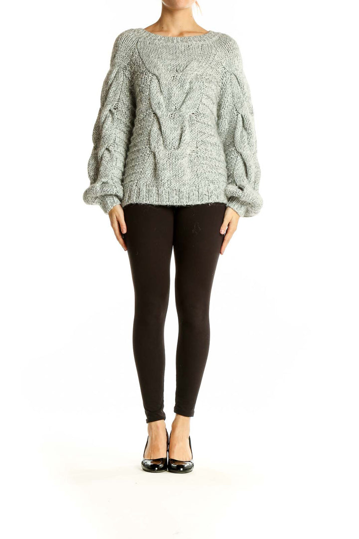 Front view of gray chunky cable knit oversized sweater from Gap