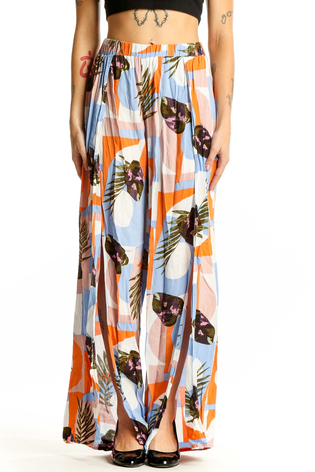 Front view of multicolor tropical print wide-leg pants by Thread Story