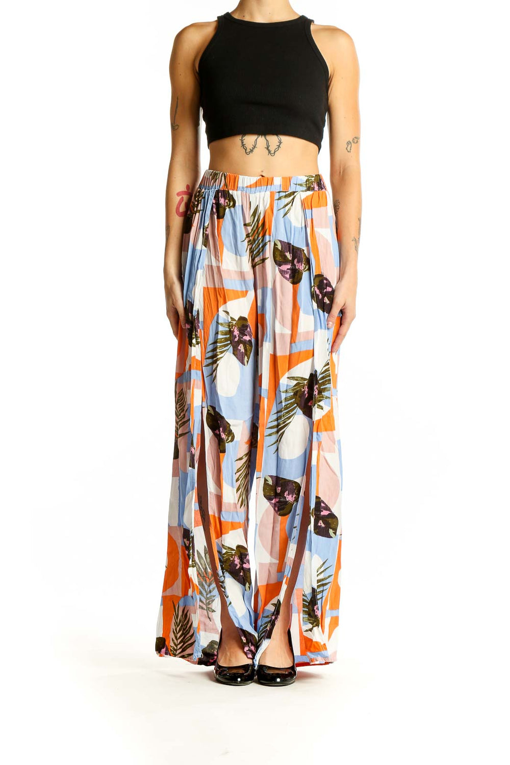 Front view of multicolor tropical print wide-leg pants by Thread Story