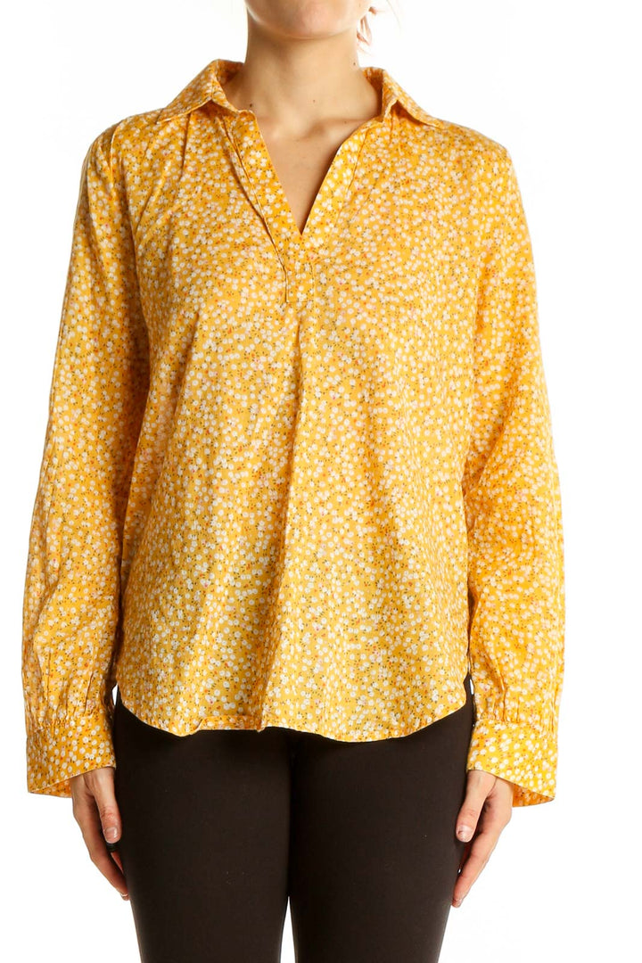 Front view of yellow floral cotton button-up shirt from LOFT Outlet