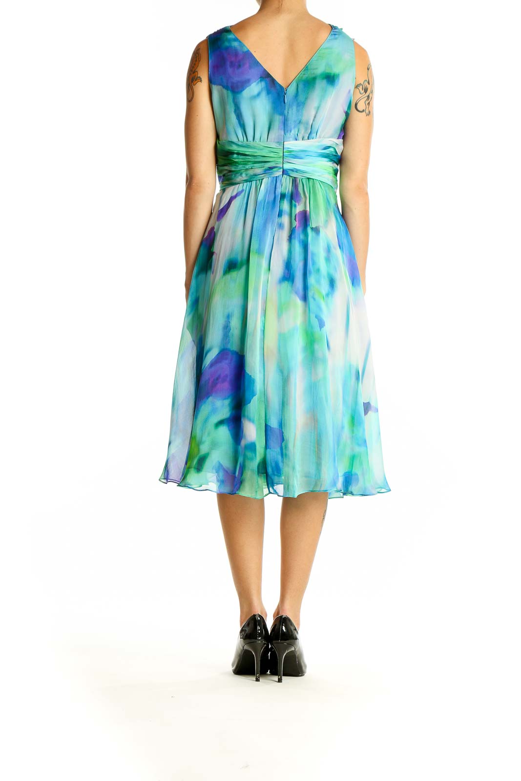 Side view of Blue and Green Watercolor Silk Cocktail Dress by Rickie Freeman for Teri Jon showing flowy skirt