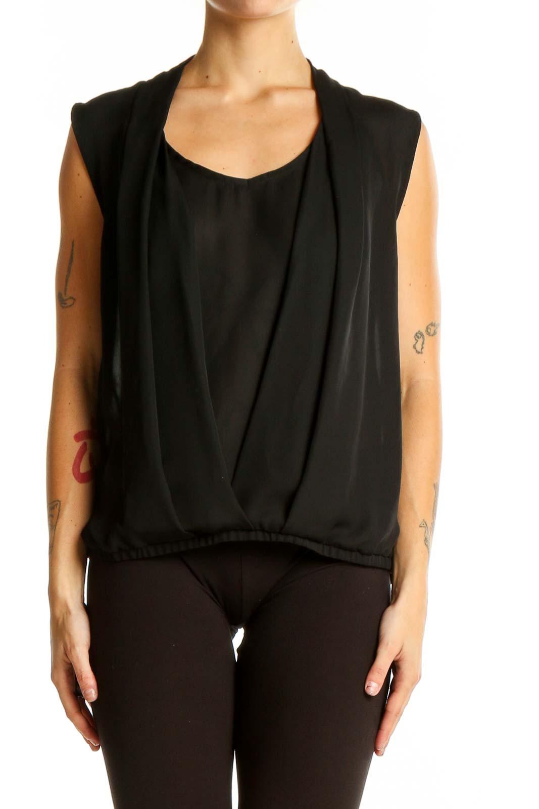 Front view of Deletta black sleeveless blouse with draped design