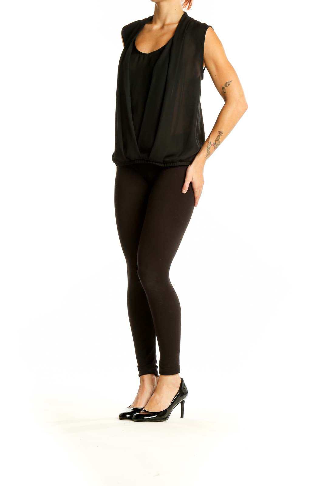 Front view of Deletta black sleeveless blouse with draped design