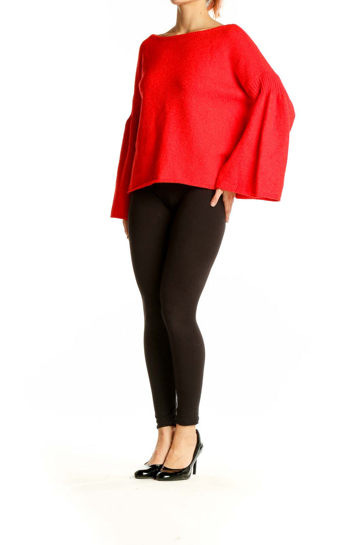 Front view of red bell sleeve knit sweater from Lou & Grey