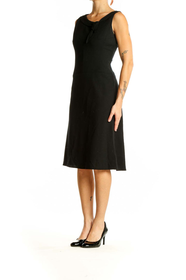 Front view of Ann Taylor LOFT black wool blend A-line dress with twisted neckline