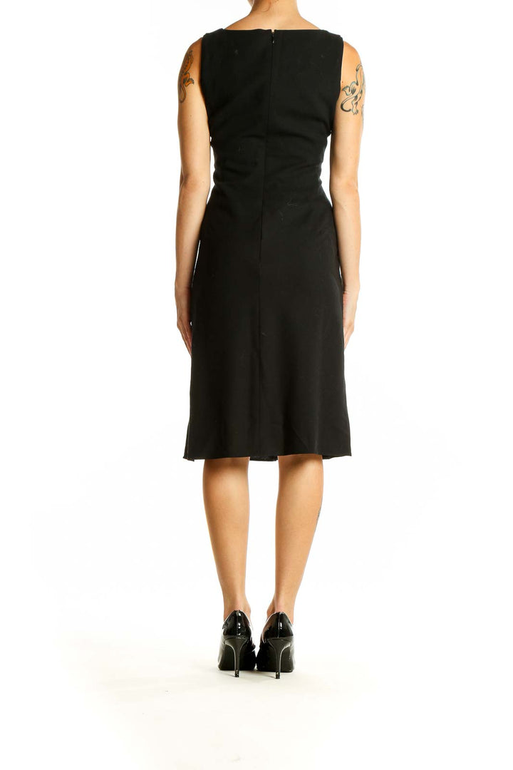 Back view of Ann Taylor LOFT black wool blend A-line dress showing sleeveless design