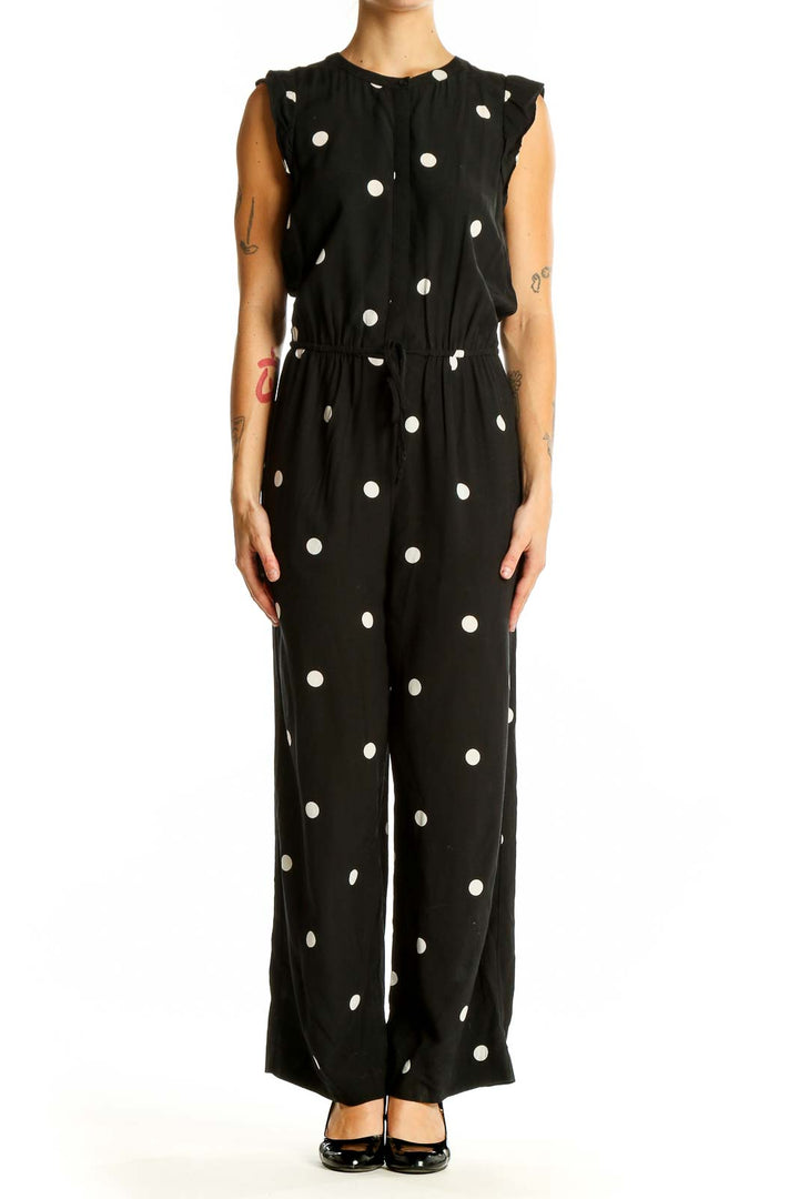 Front view of LOFT black polka dot sleeveless jumpsuit