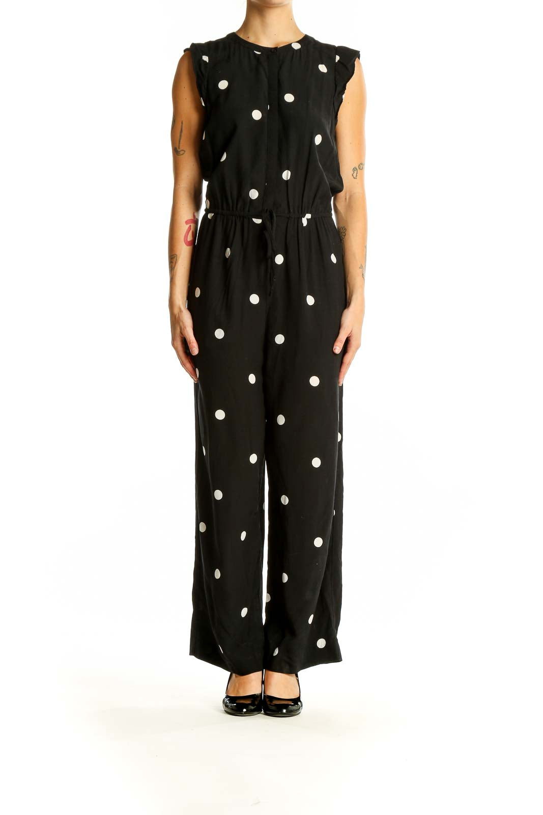 Front view of LOFT black polka dot sleeveless jumpsuit