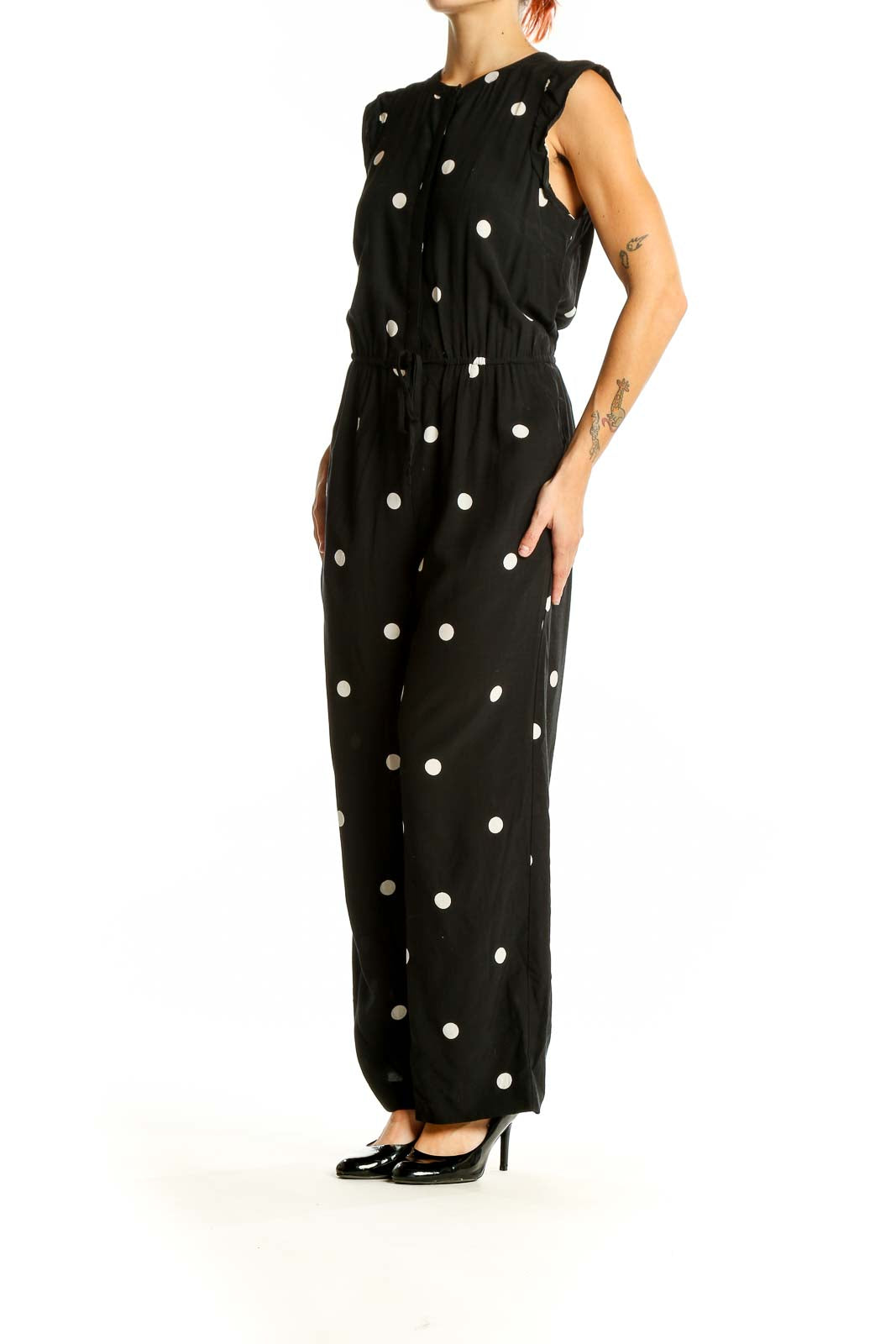 Front view of LOFT black polka dot sleeveless jumpsuit