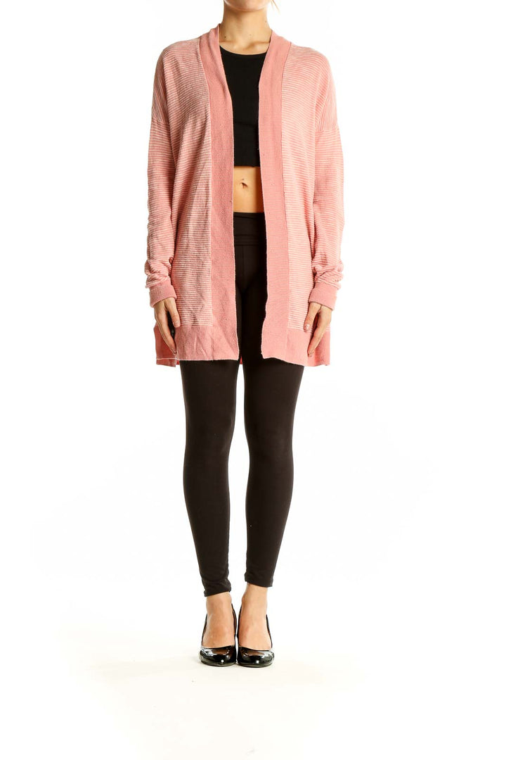 Front view of pink ribbed cotton open-front cardigan from Gap