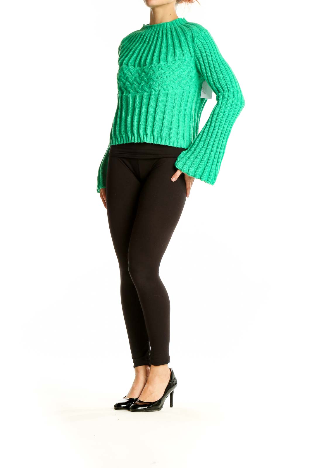 Front view of green ribbed cropped sweater with mock neck and bell sleeves