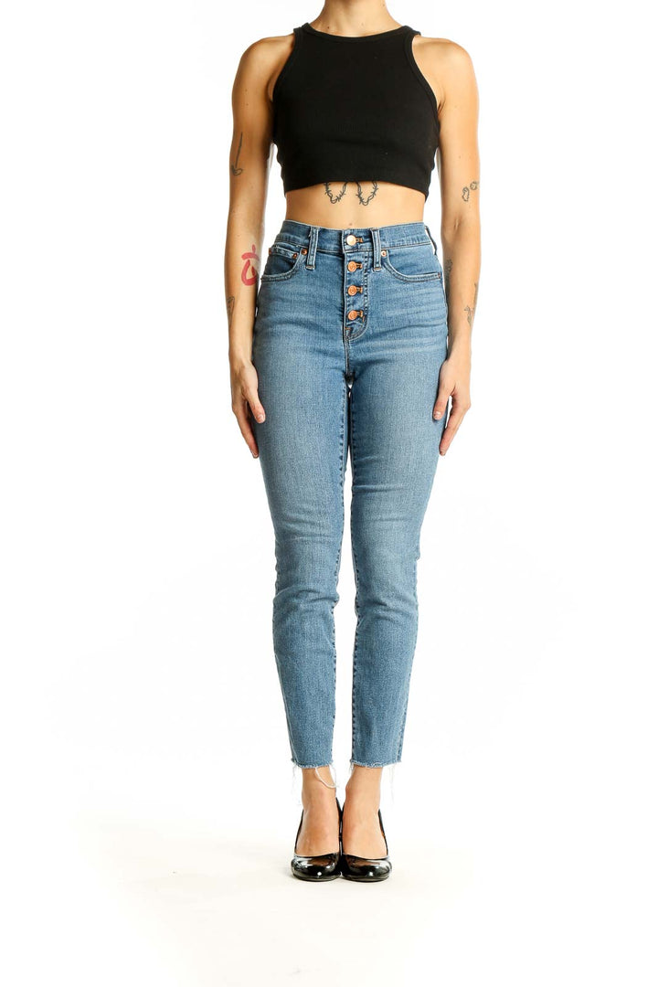 Front view of J.Crew light blue high-waisted jeans with button-fly