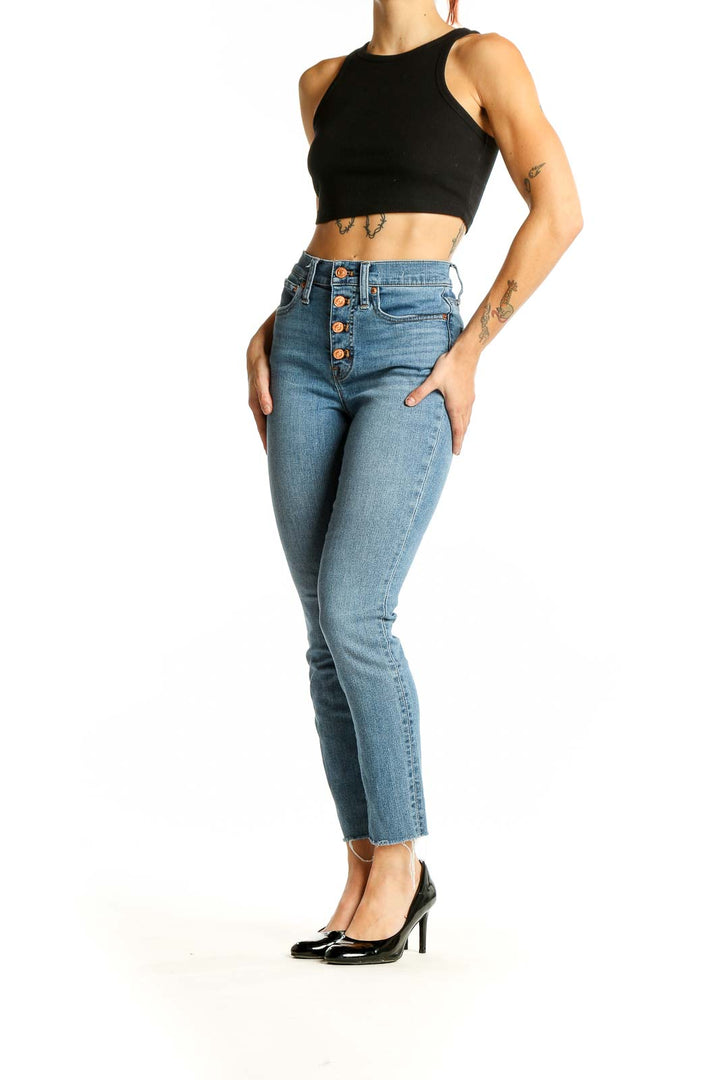 Front view of J.Crew light blue high-waisted jeans with button-fly