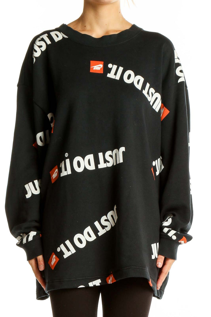 Front view of black Nike oversized sweatshirt with 'Just Do It' print