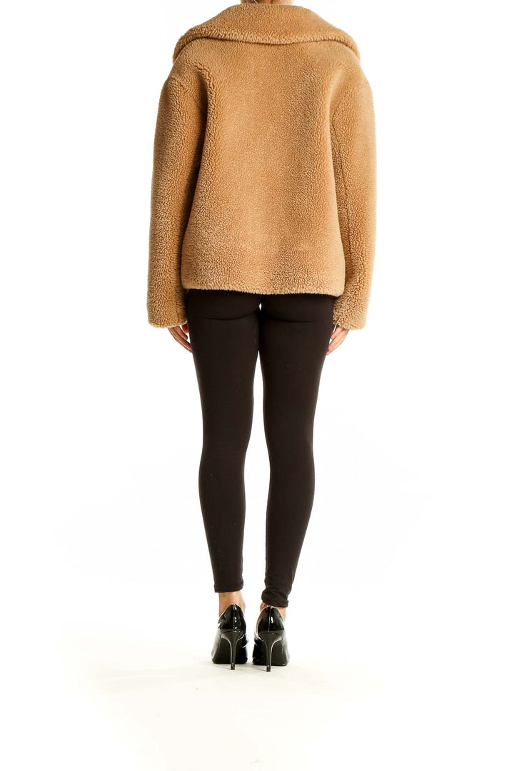 Back view of Zara camel teddy bear cropped jacket on model