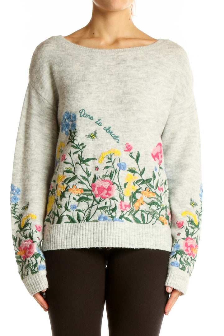 Front view of SilkRoll gray knit sweater with colorful floral embroidery