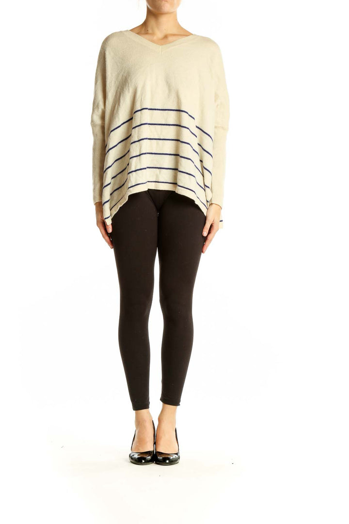 Front view of White+Warren cream cashmere V-neck sweater with navy stripes