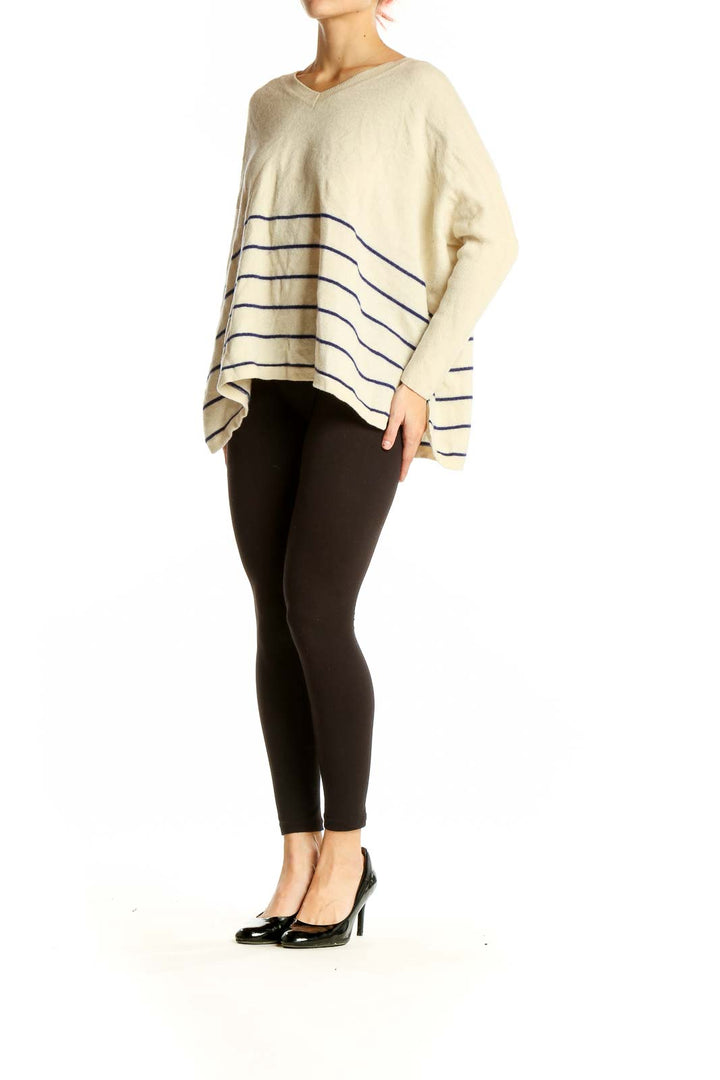 Front view of White+Warren cream cashmere V-neck sweater with navy stripes