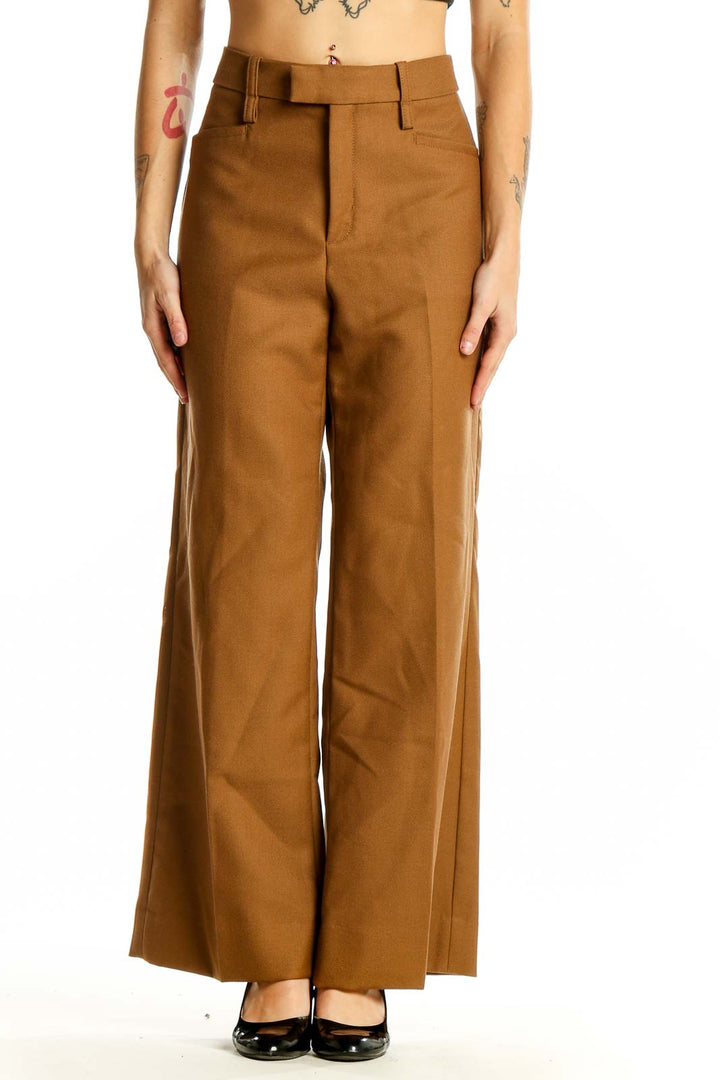 Front view of Banana Republic brown wool wide-leg trousers on model