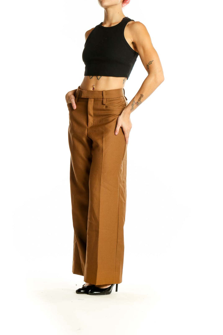 Front view of Banana Republic brown wool wide-leg trousers on model