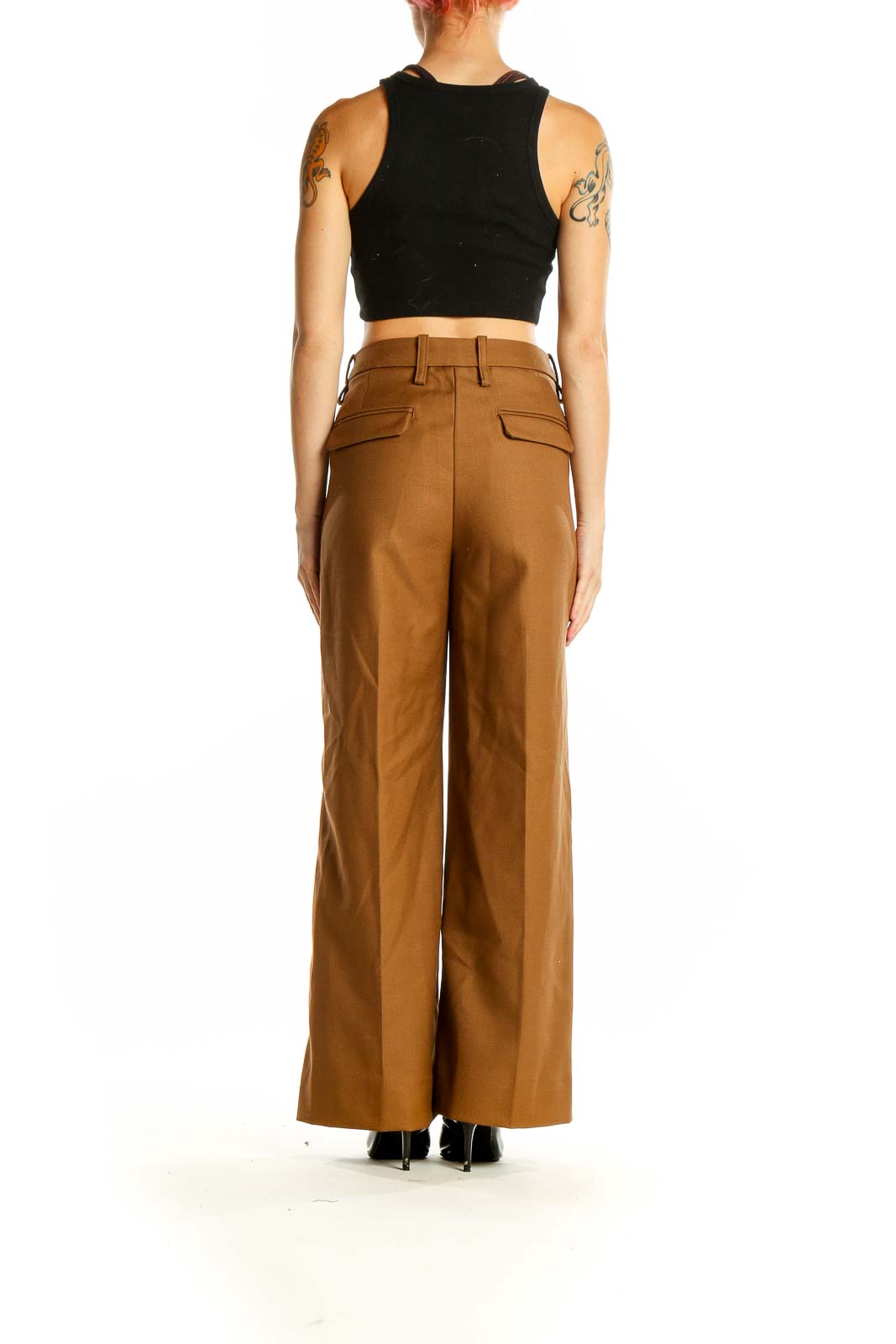 Side view of Banana Republic brown wool wide-leg trousers on model with black top