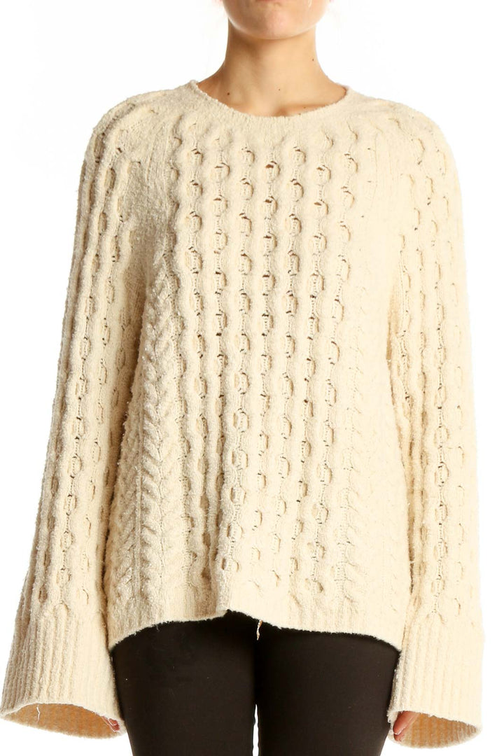 Front view of J.Crew cream cable knit sweater with crewneck