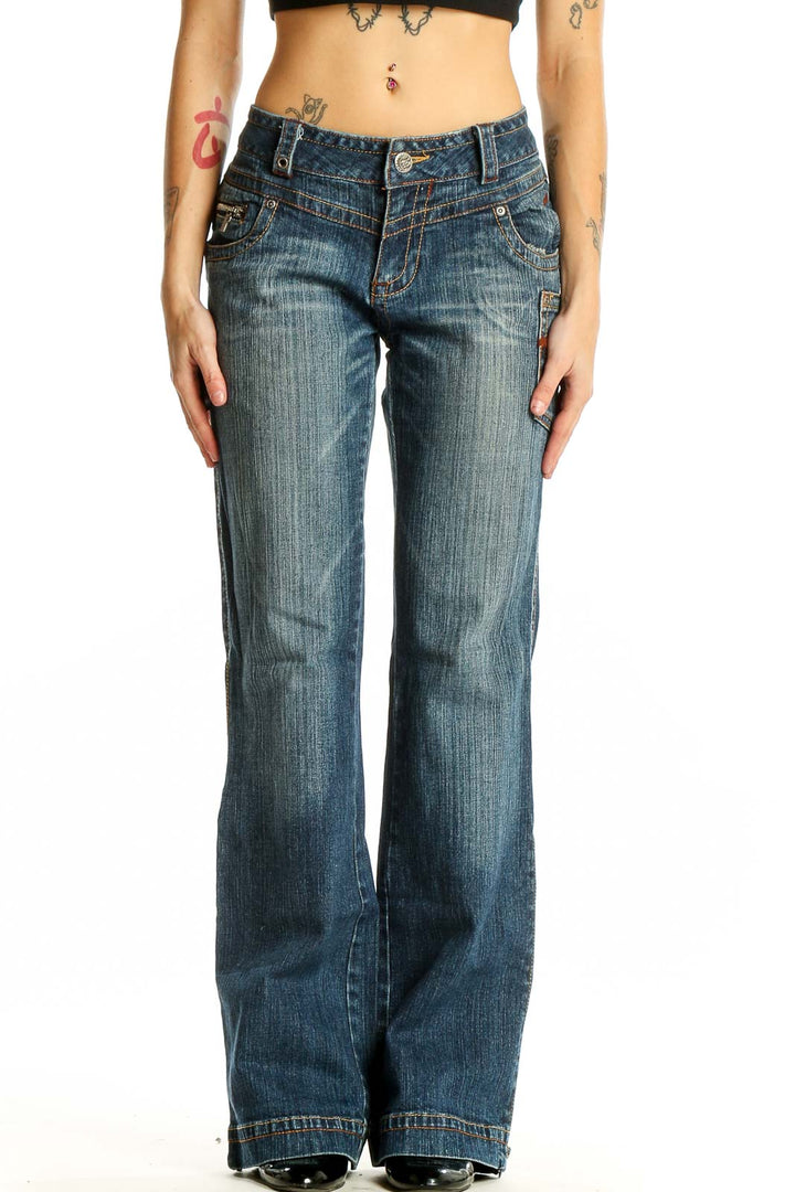 Front view of Rocawear blue distressed wide-leg jeans on model