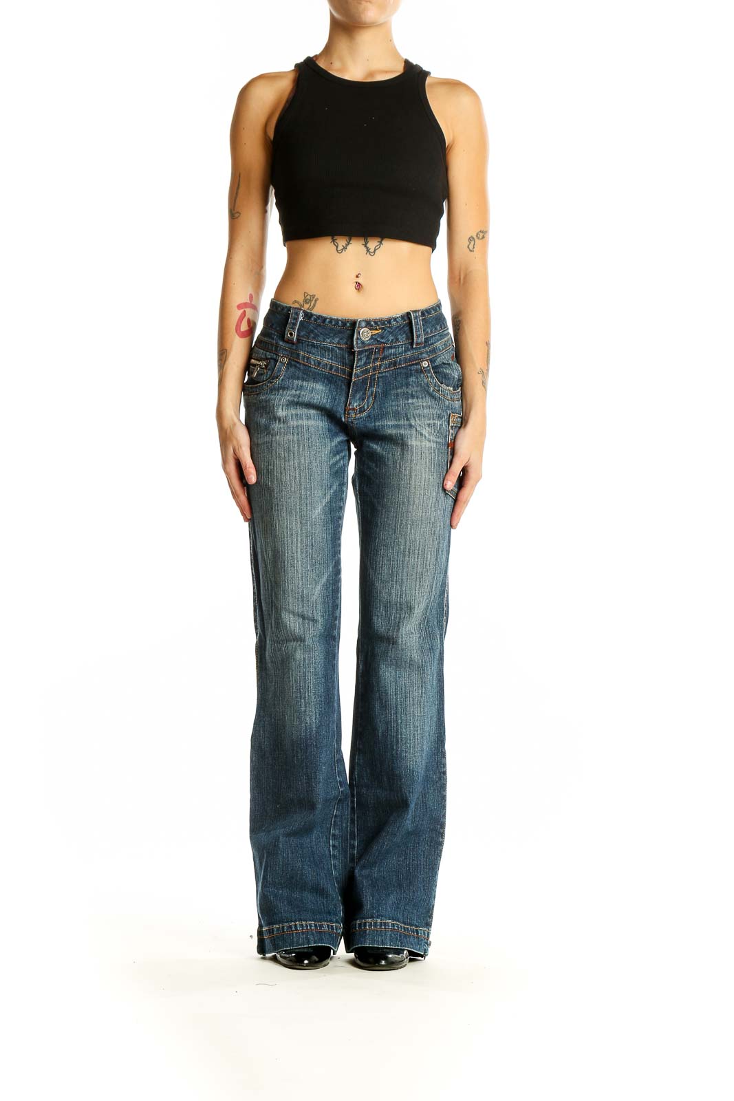 Front view of Rocawear blue distressed wide-leg jeans on model