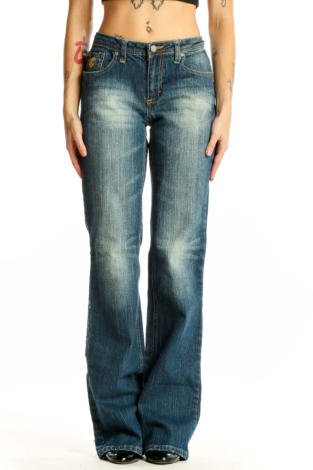 Front view of Rocawear blue distressed wide-leg jeans on model