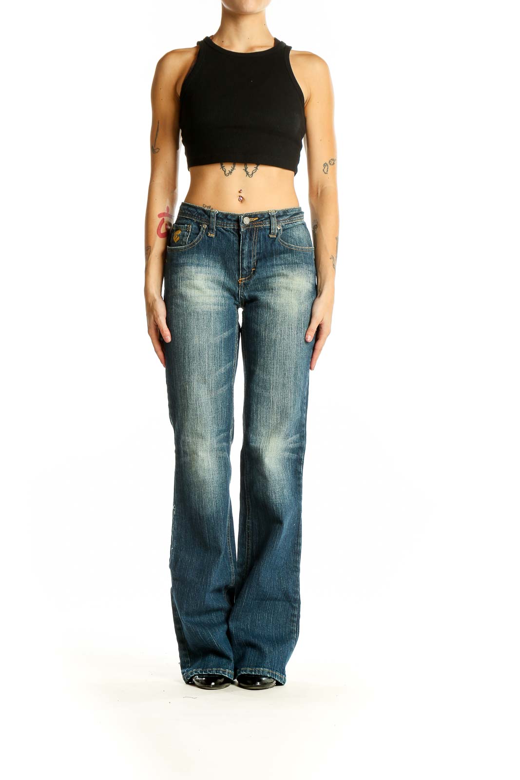 Front view of Rocawear blue distressed wide-leg jeans on model