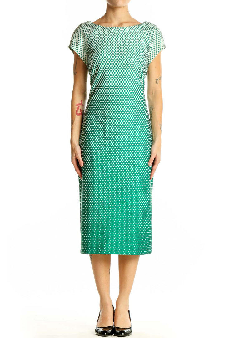 Front view of SAMI+DANI green ombre polka dot midi dress with flutter sleeves