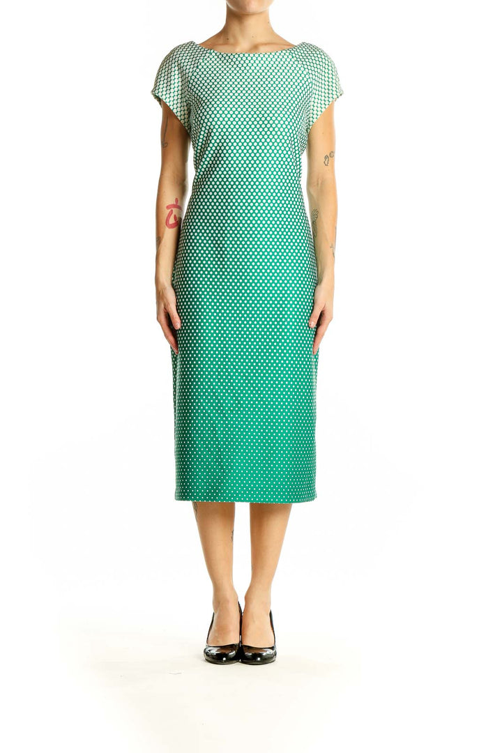 Front view of SAMI+DANI green ombre polka dot midi dress with flutter sleeves