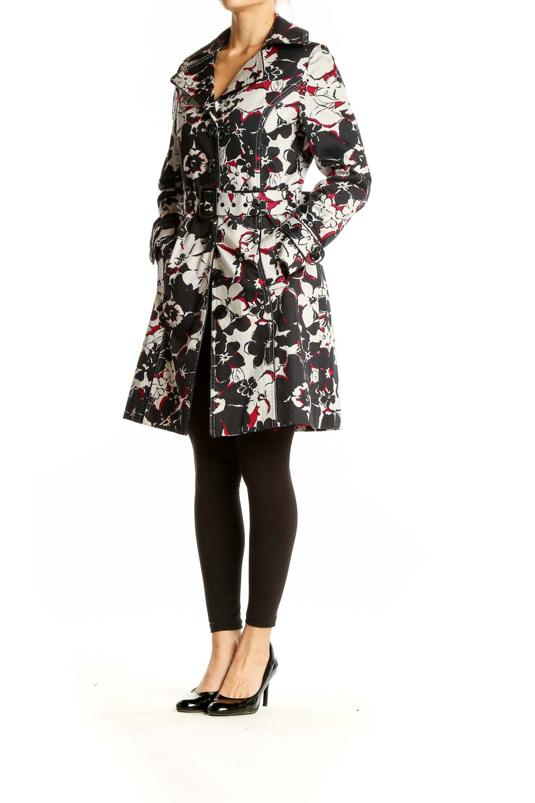 Front view of Vertigo Paris Black Floral Print Trench Coat on model