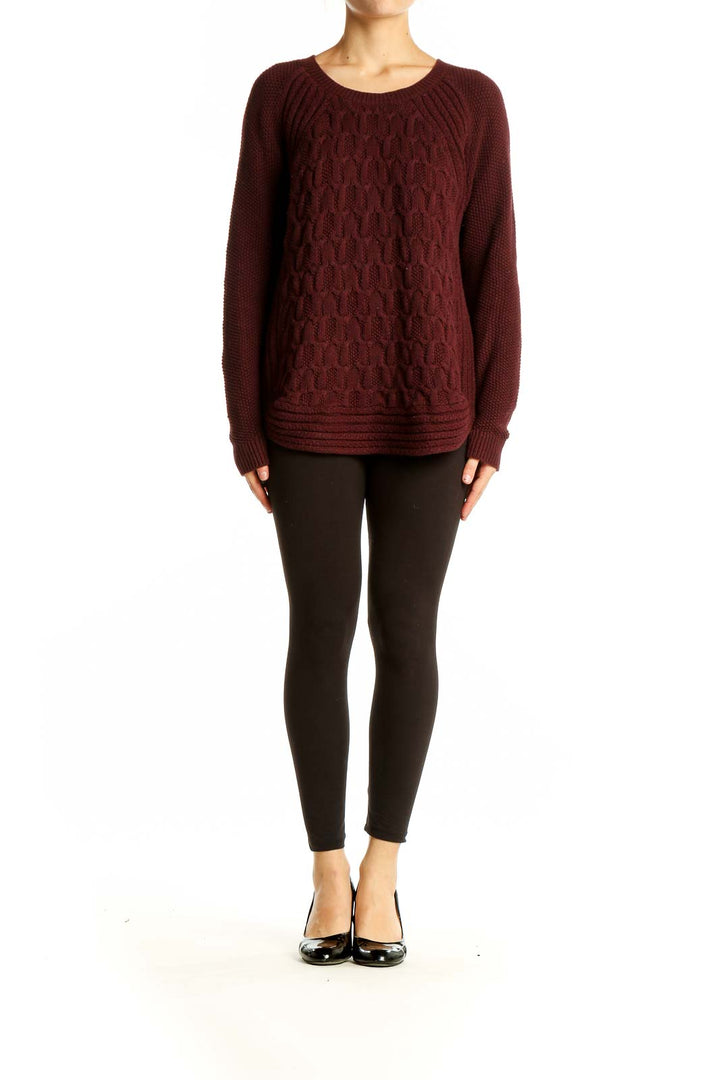 Front view of burgundy cable knit sweater with raglan sleeves