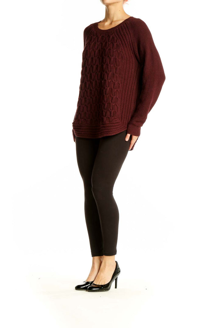 Front view of burgundy cable knit sweater with raglan sleeves