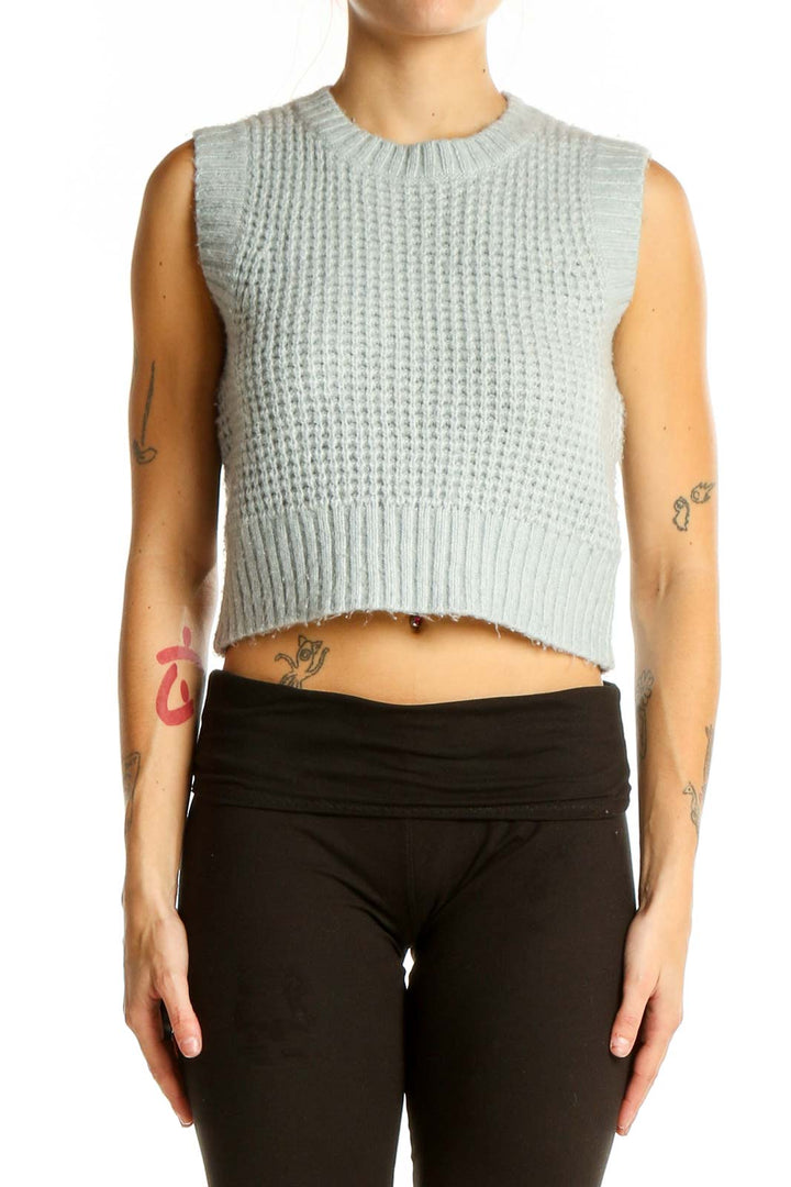 Front view of Jessica Simpson mint green cropped sleeveless sweater with waffle knit texture