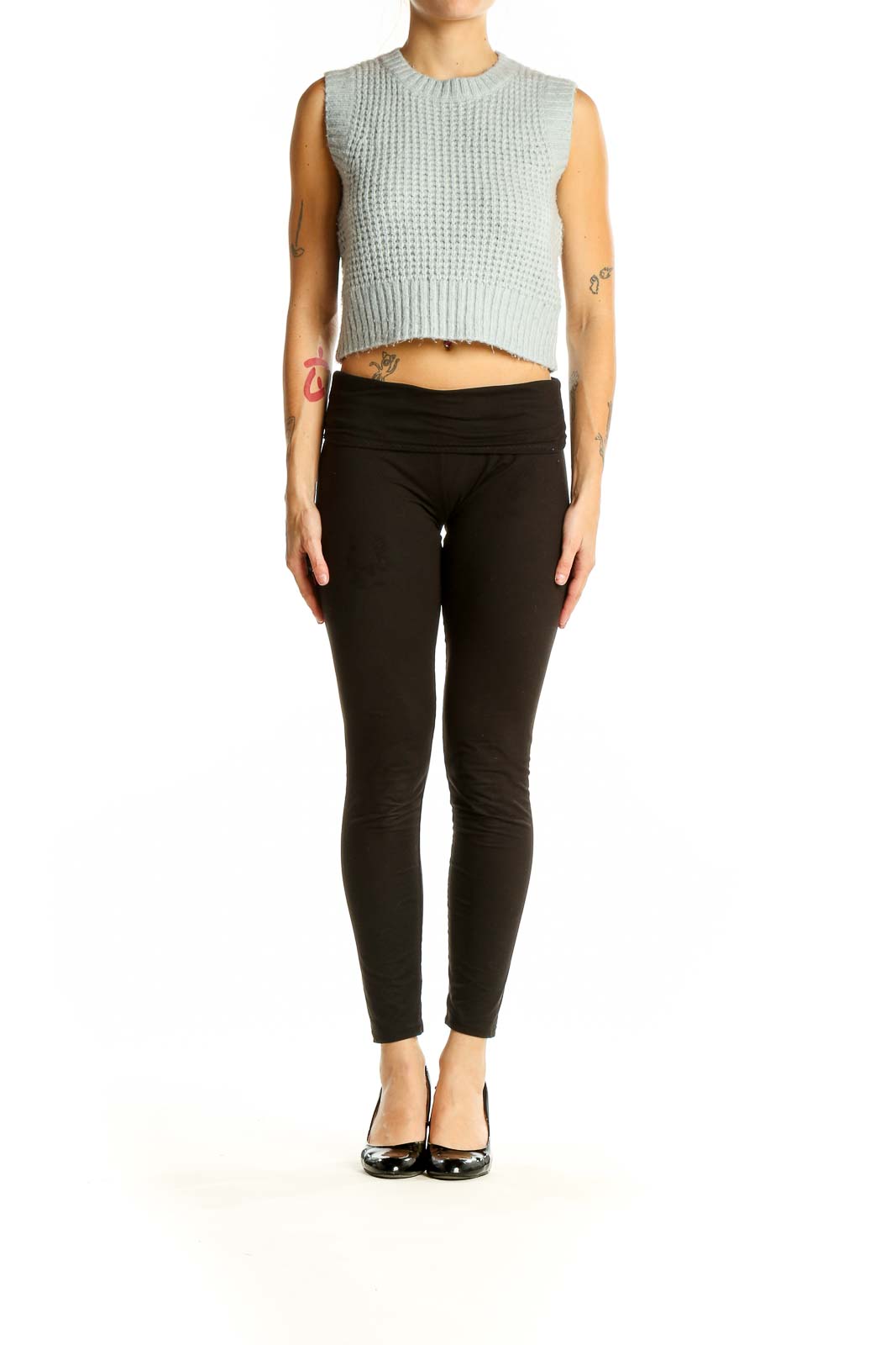 Front view of Jessica Simpson mint green cropped sleeveless sweater with waffle knit texture