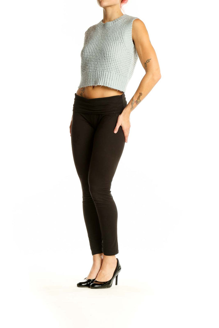 Front view of Jessica Simpson mint green cropped sleeveless sweater with waffle knit texture