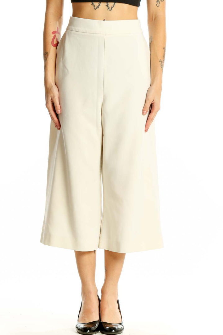 Front view of French Connection cream wide-leg cropped trousers