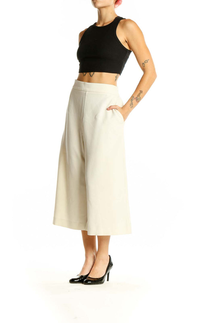 Front view of French Connection cream wide-leg cropped trousers