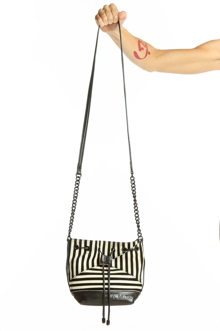 Front view of L.A.M.B. Black and White Striped Leather Shoulder Bag with chain strap