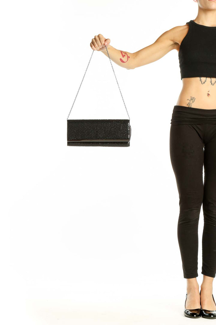 Front view of Jessica McClintock black textured clutch with chain strap