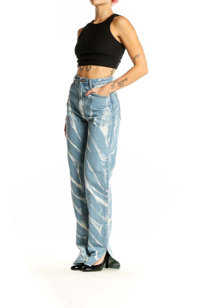 Front view of LIONESS light blue tie-dye high-waisted straight jeans with diagonal streak pattern