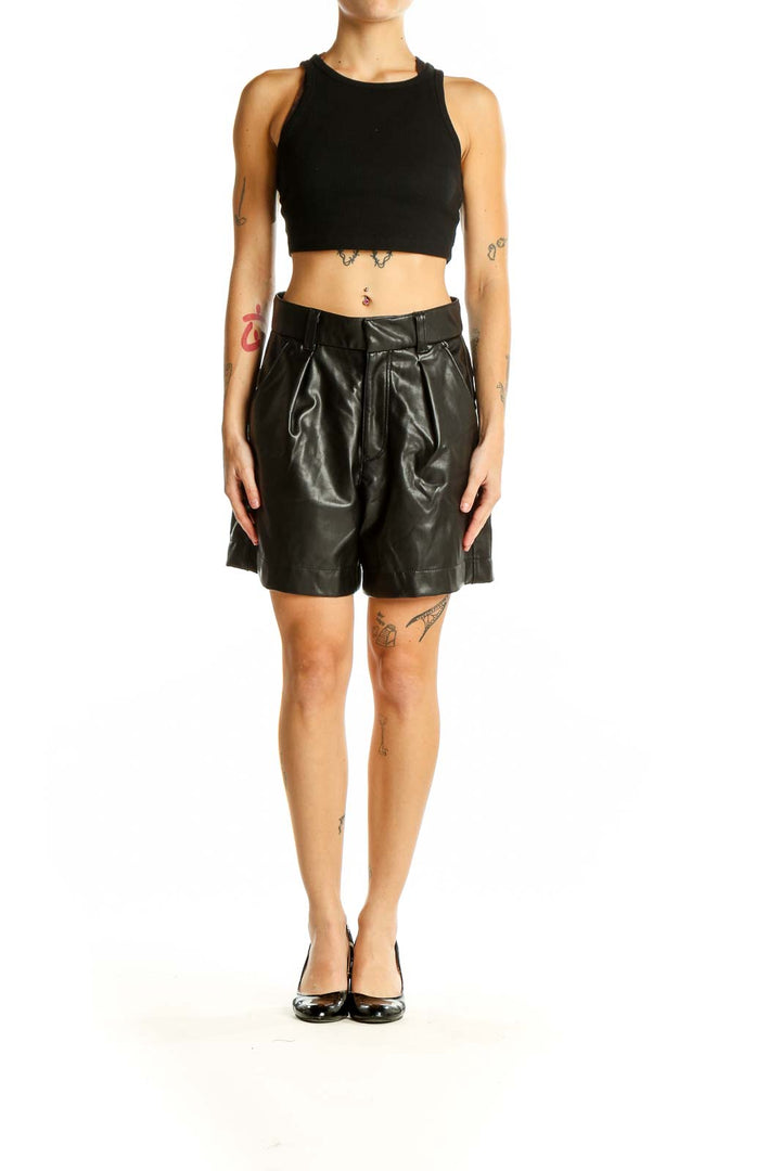 Front view of Abercrombie & Fitch black faux leather high-waisted pleated shorts