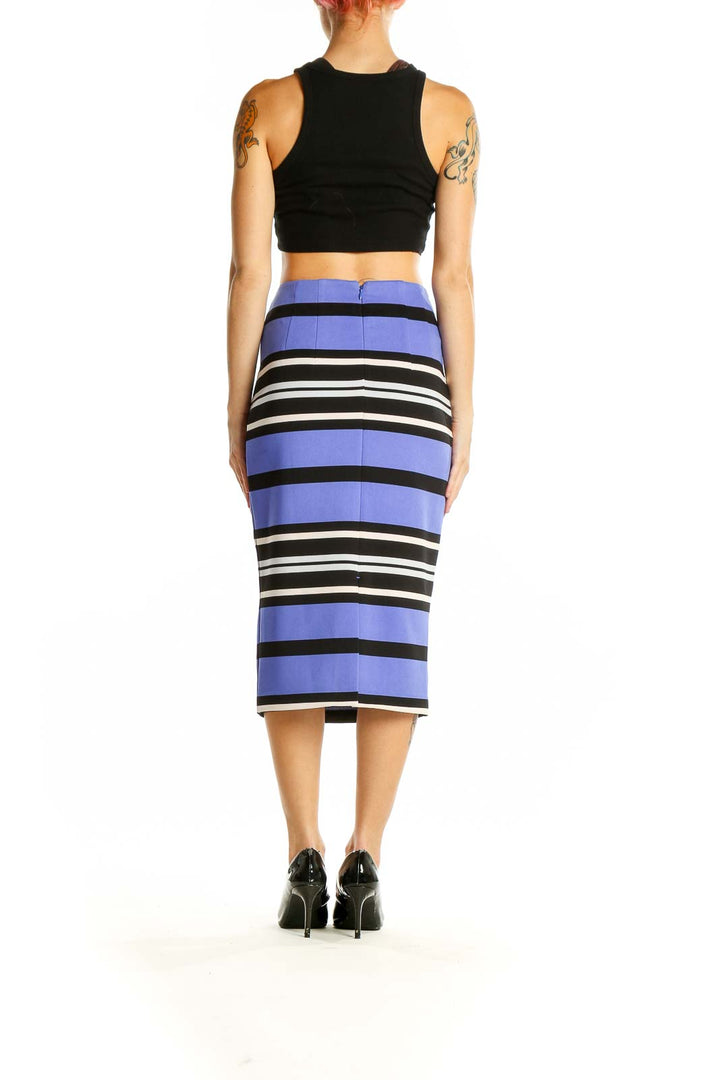 Side view of Express purple striped midi pencil skirt on model