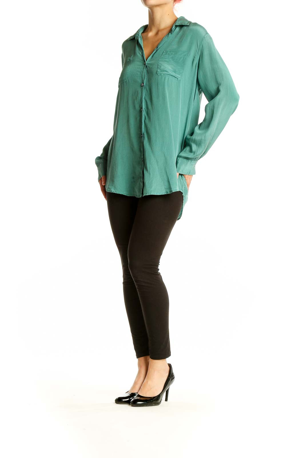 Front view of green silk button-down blouse by Calypso