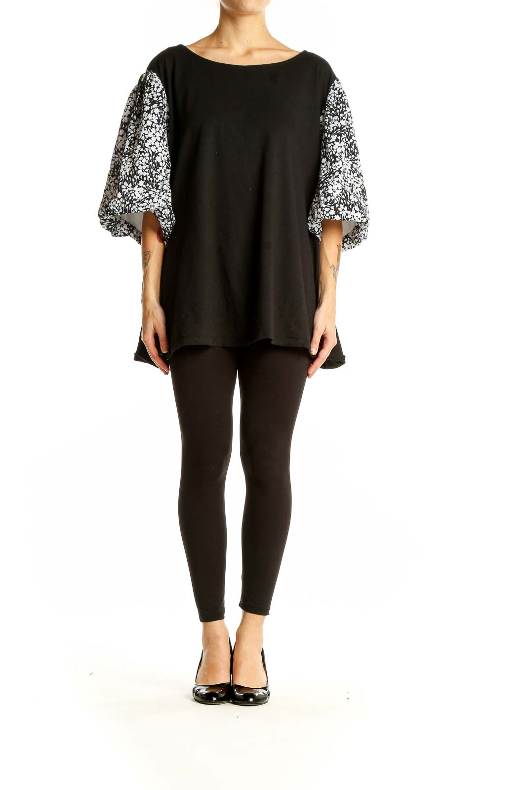 Front view of Talbots black top with floral print balloon sleeves